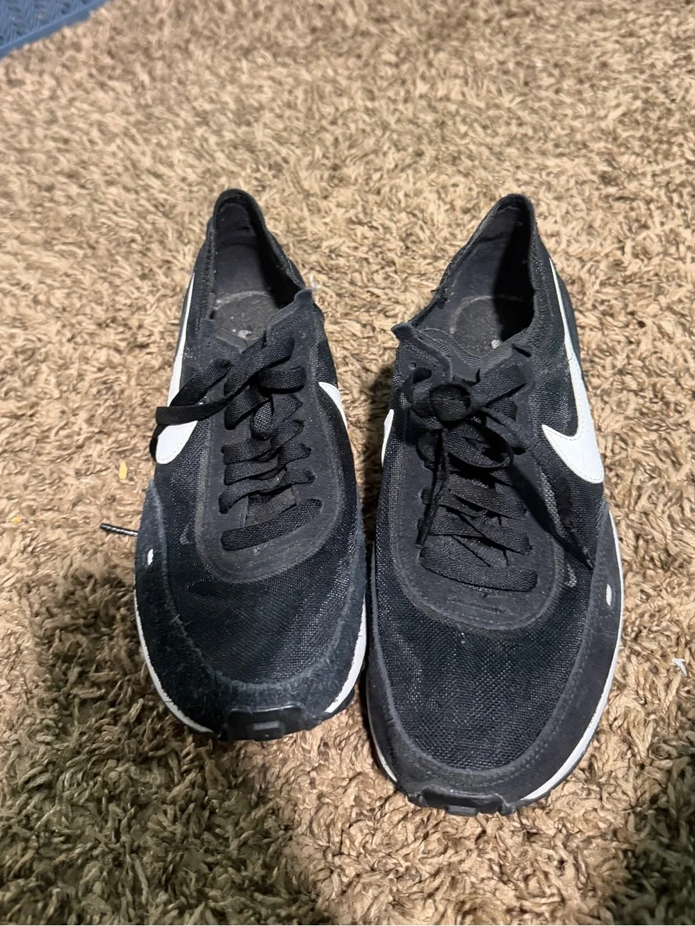 Nike Men’s Black Sneakers with White Swoosh
